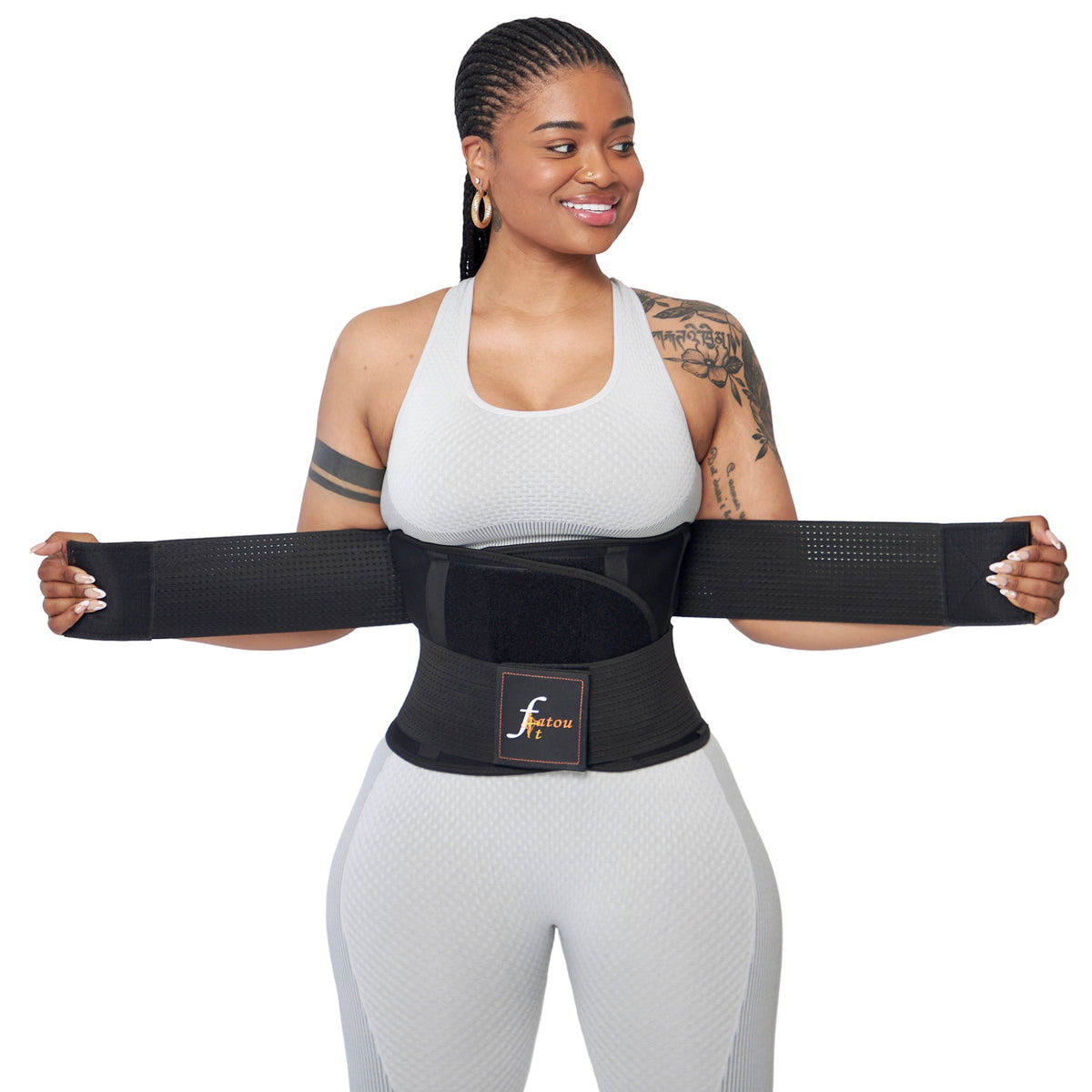 Woman wearing FatouFIT waist trainer belt with velcro closures and an adjustable double compression strap design, made with neoprene fabric.